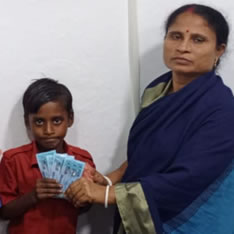Lotus Ministry Trust Volunteer and a Relief Recipient