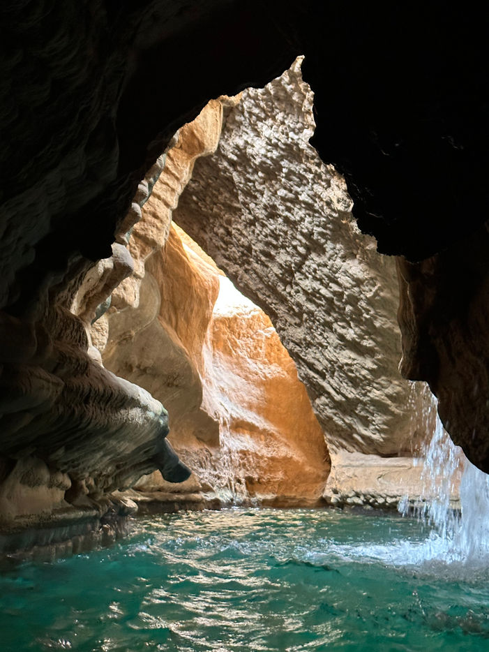 Wadi Shab, Bimmah Sinkhole, and Romantic Cave day tour in Oman with hiking, swimming, and nature exploration.
