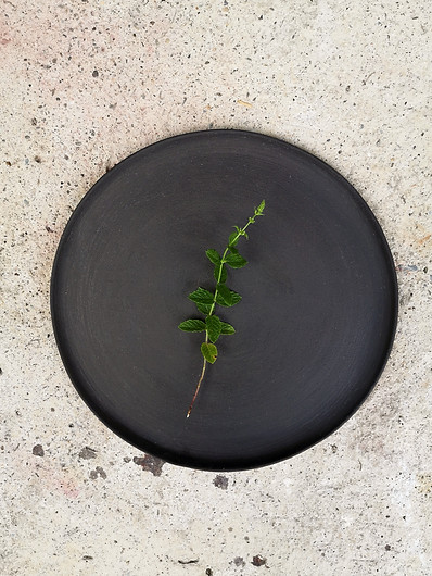 Aneta Popova, contemporary artist, Skopje, LIPA ceramics, Matka Canyon, handmade ceramic art and design, dinnerware, simple black plate.