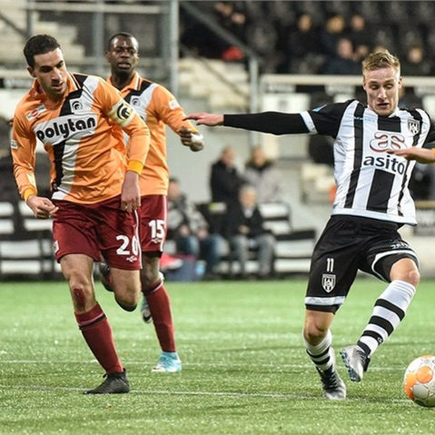 Wael Romdhane competing as captain during a U23 Eredivisie match, wearing number 20.