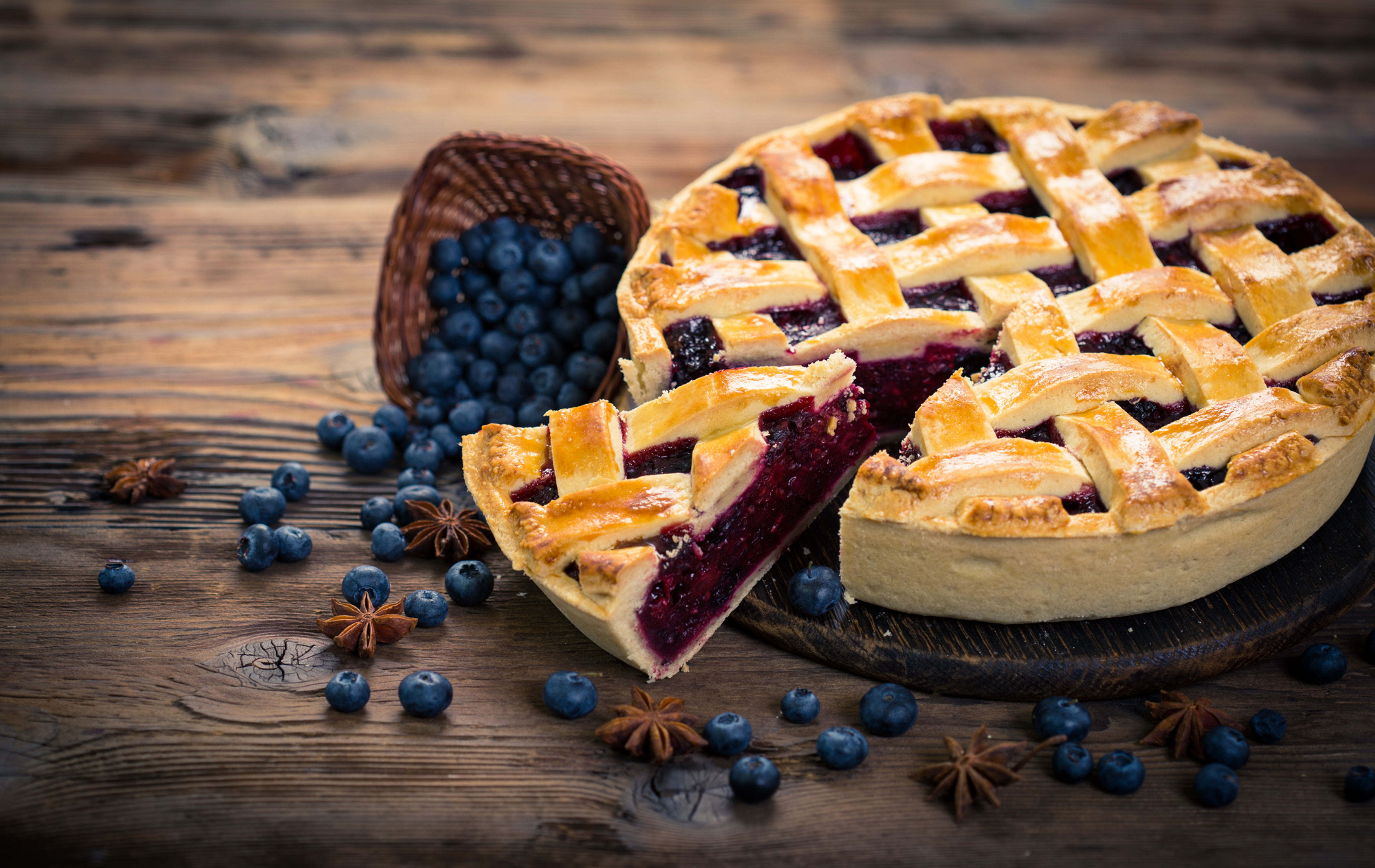 Blueberry pie with lattice crust and juicy berry filling, made from scratch.