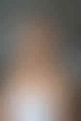 bride looking at camera and smiling after successful bridal preview trial