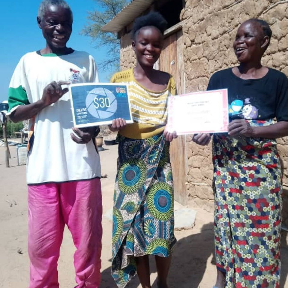 Precious Kashitu with her parents, Isepe Girls Club, Zambia