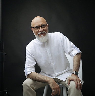 Sayyid sitting on a chair