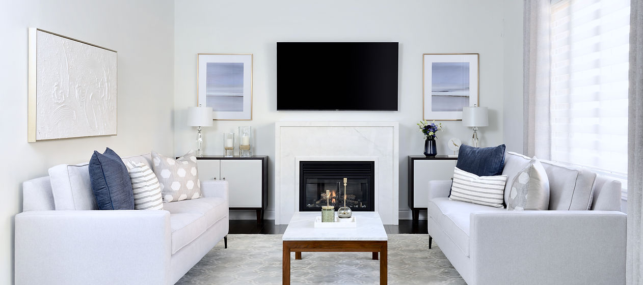 Family Room with Two Sofas and Stone Fireplace
