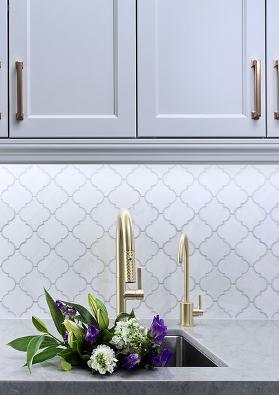 Brass Faucet with Marble Backsplash,