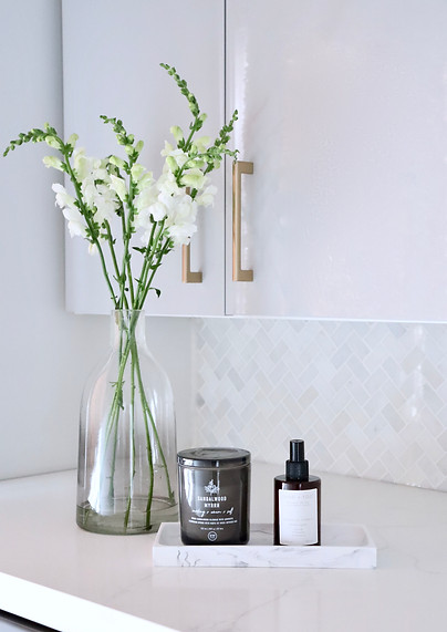 Laundry Room, grey uppers, quartz counter and herringbone backsplash