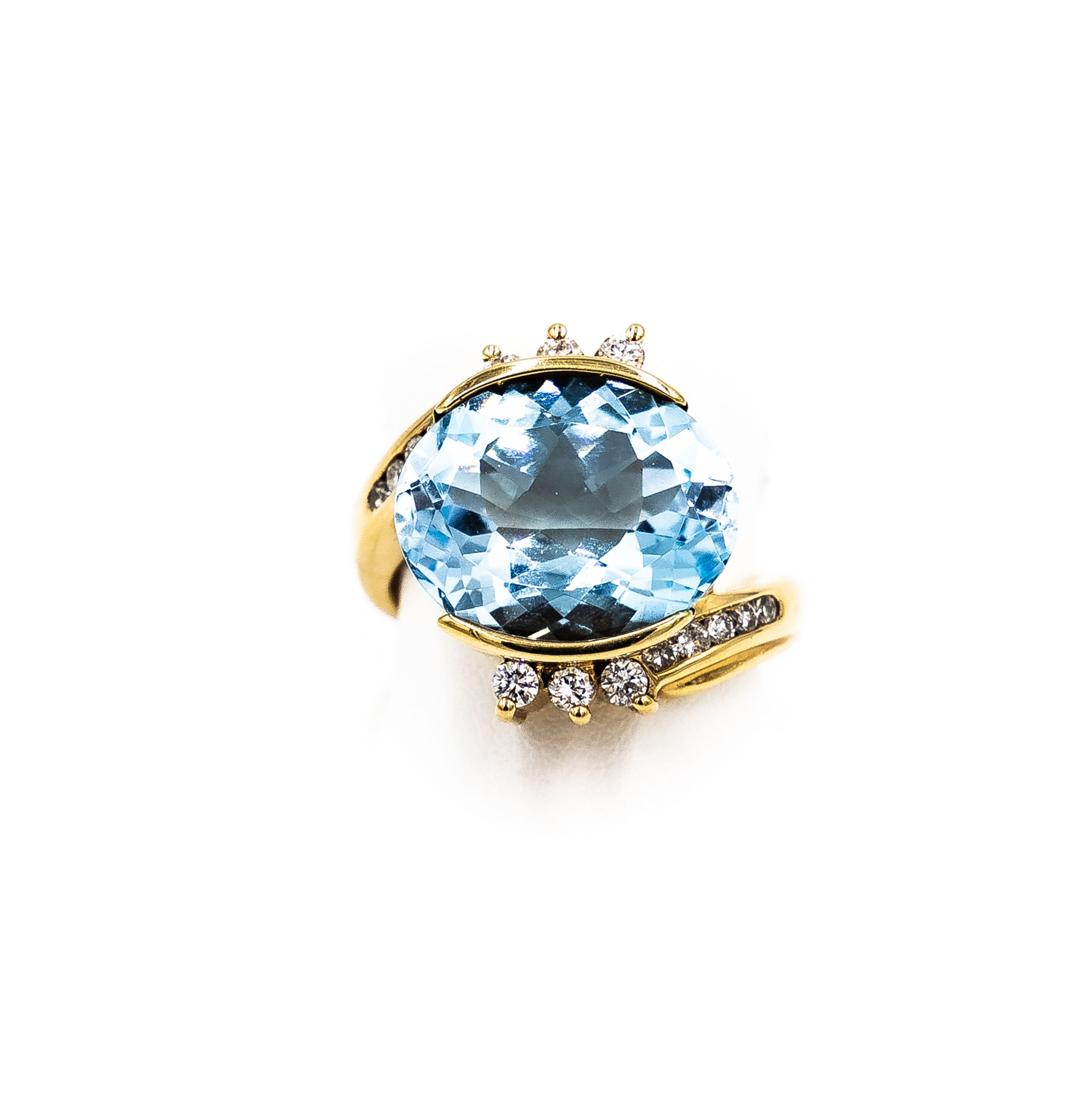 Yellow Gold Oval Blue Topaz Set East to West Ring