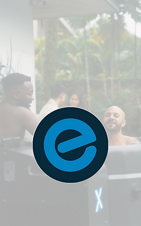 people smiling in an Echelon hot tub in a tropical setting