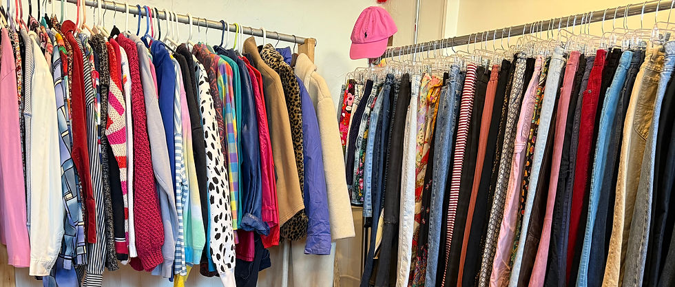 Colorful racks of clothing that can be found within the Resouled Threads storefront