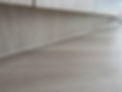 silicone sealing - floor tiles to kitchen kick board