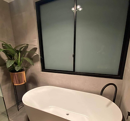 Worx bathroom reno black sliding window with 6.38 translucent laminated glass2.png