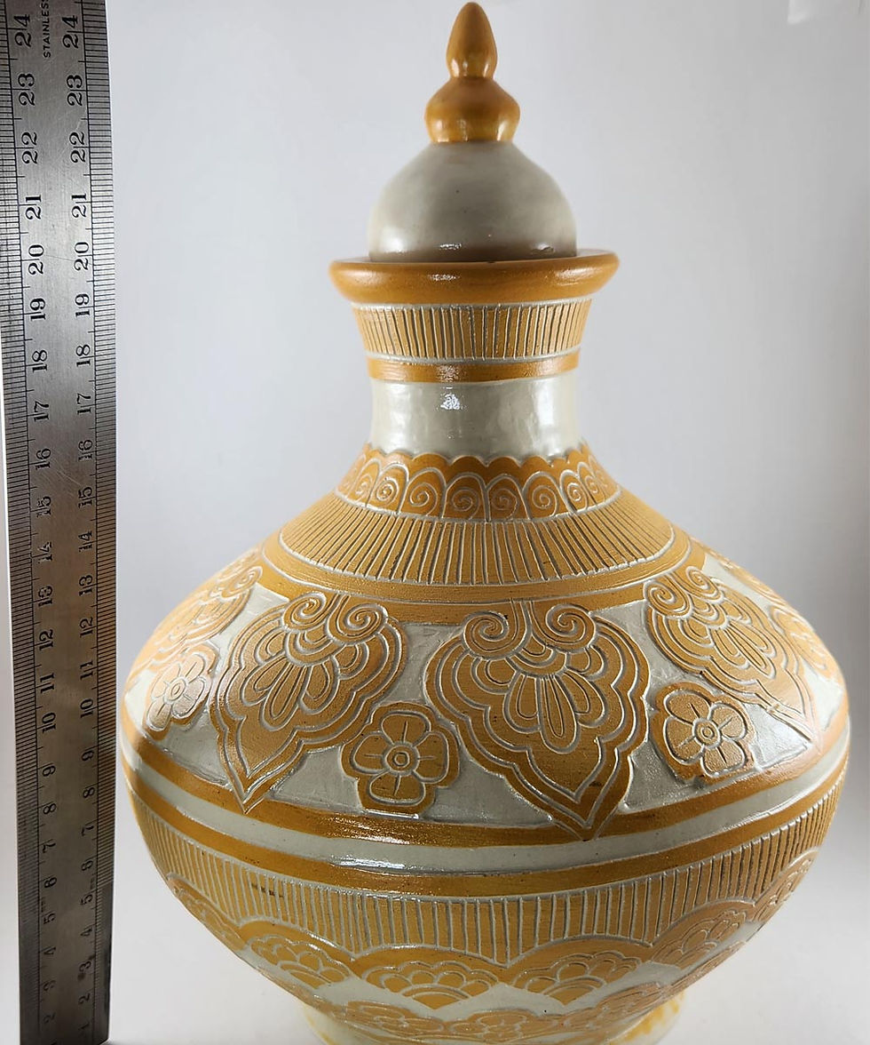 Thumbnail: Large hand carved yellow ceramic urn