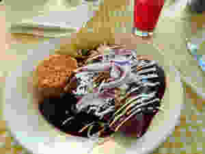 Enchilladas topped with mole sauce, photo: Ruth and Dave via Visual hunt / CC BY