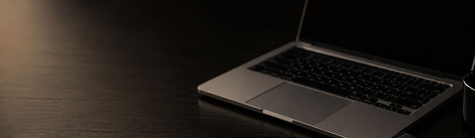 Laptop workspace for branding, web design and creative services
