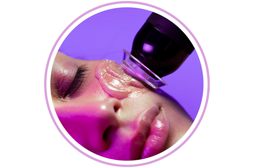 Woman receiving a Glo2 Facial RF treatment under purple light