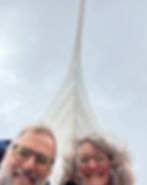 Silver monument, silver haired tourists.
