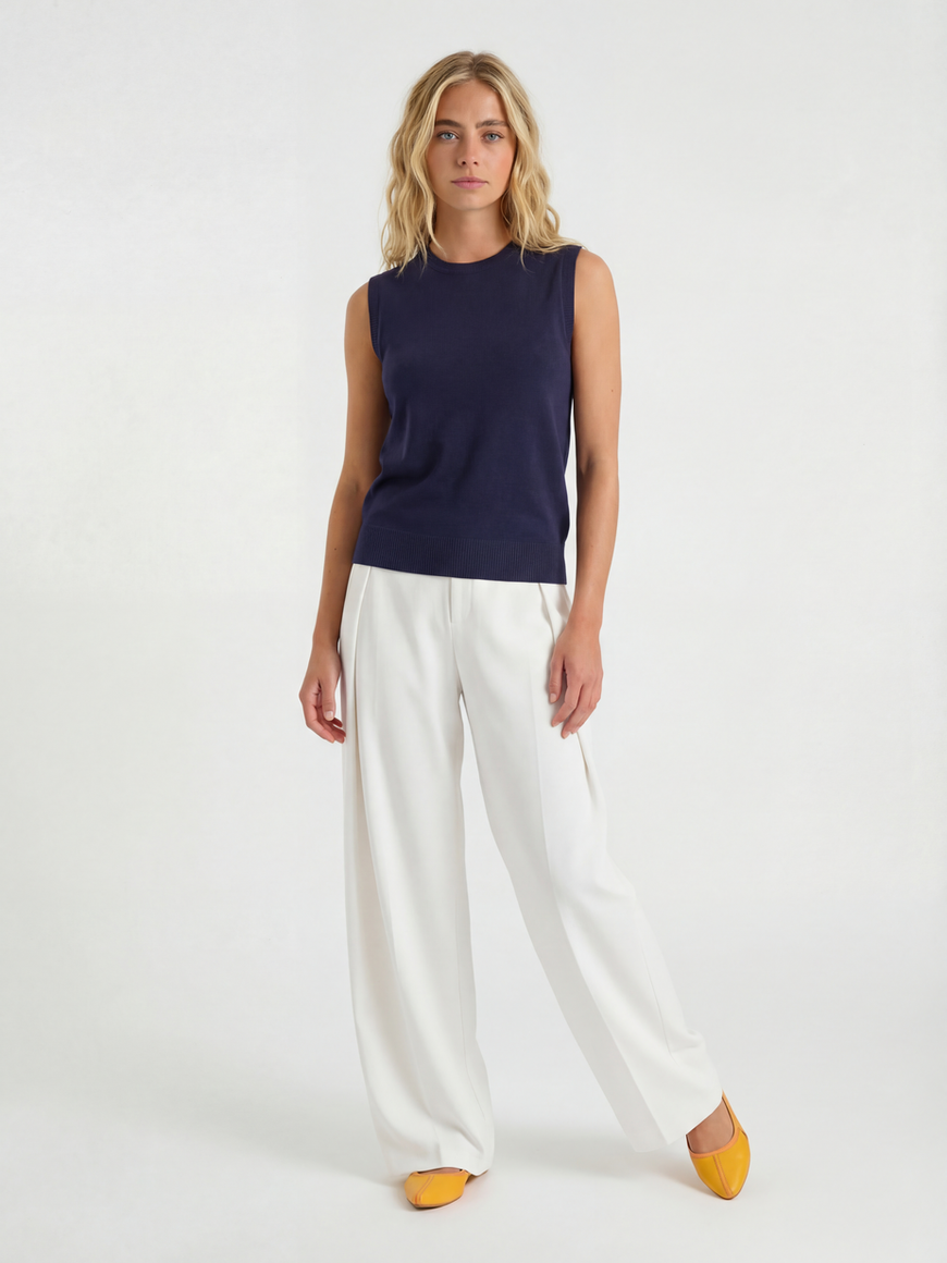 Women’s cotton wool knit sweater vest with round neck and sleeveless design. Machine washable vest top for work casual wear.