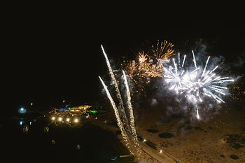 Fireworks at a summer 2024 real wedding planning story.