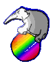 Logo der Schule: Elefant auf mehrfarbigem Ball, um sich selbst drehend
