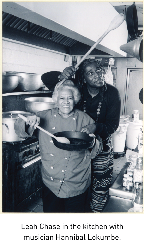 Leah Chase in the kitchen with musician Hannibal Lokumbe.
