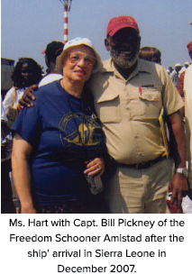 Ms. Hart with Capt. Bill Pickney of the Freedom Schooner Amistad after the ship’ arrival in Sierra Leone in December 2007.