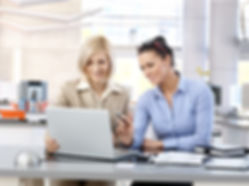 Women working at a computer