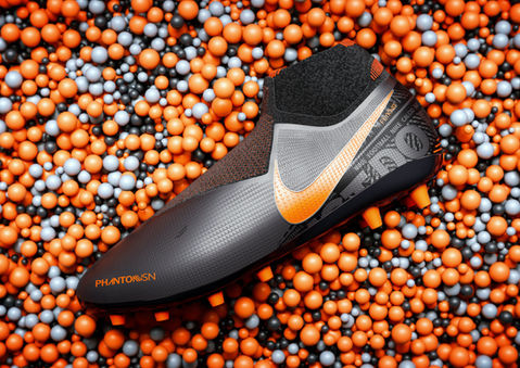 Photorealistic 3D CGI render of a Nike Phantom football boot featuring intricate texture mapping, high-fidelity material shaders, and studio-quality lighting by Wake Deep Studio.