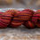 Thumbnail: Worsted Weight Merino "Crimson Sunflower"