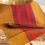 Thumbnail: Handwoven Organic Cotton Kitchen Towel "Gathering" (rust/burgundy weft)
