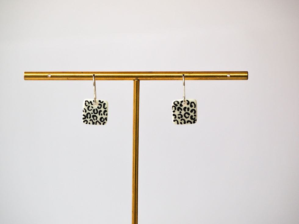 Thumbnail: Black Leopard Print Dangle Earrings
