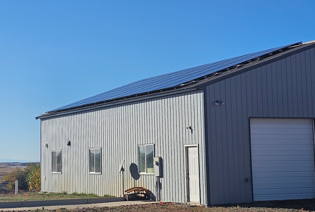Solar panels installed on a metal-roof building