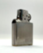 The steel insert with Pat Pend stamp signifies that the table lighter was produced in 1953-1956.
