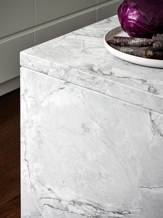 white marble detail in kitchen, waterfall detail in kitchen in white marble