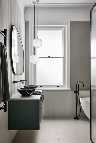 Bathroom with double vanity and floor mounted bath spout