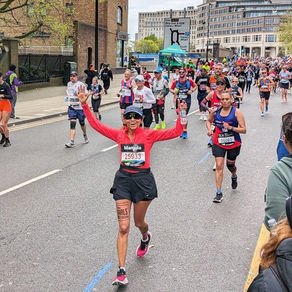 Marathon runner wearing her charity temporary tattoos