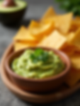 freshly made guacamole and crispy tortilla chips.png
