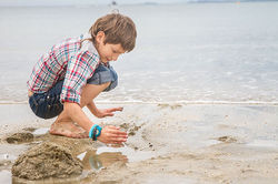 outdoor portrait of happy child boy