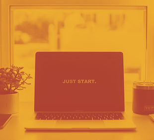 macbook pro on white table_edited_edited