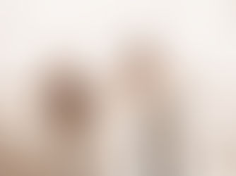 a mum and dad each with a child on their back leaning forward with arms outstretched used on a blog about investing for children