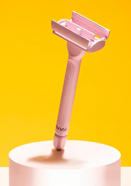 Product-forward beauty photography highlighting Hanni razor design