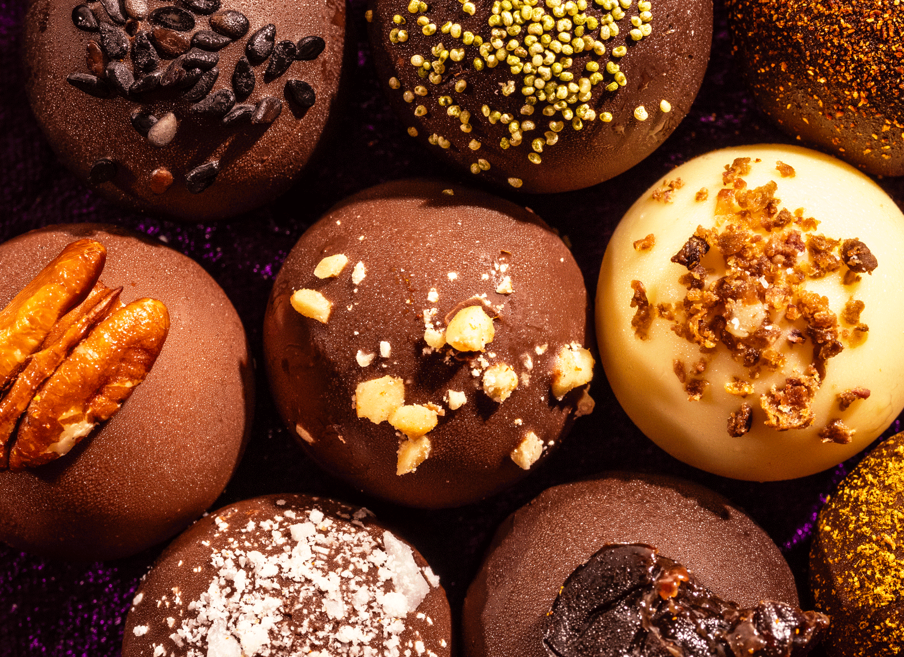 gif of moving bouncing high end luxury chocolate truffles