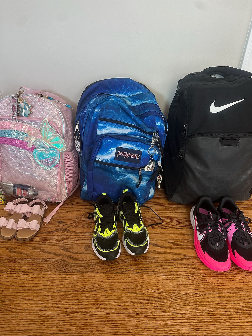Pink, blue, and black backpacks on wood floor, with matching shoes. Notable patterns include sparkles, waves, and a logo.