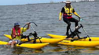 Phil on his Waterbike with Glenn Druery from Sydney