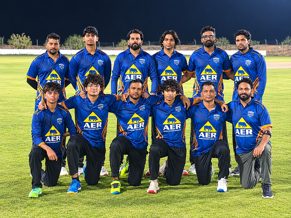 Arabian Equipment Rentals LLC (AER) cricket team posing together in matching blue and orange jerseys on a cricket field at night.