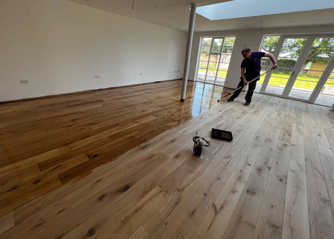 Professional applying hardwax oil