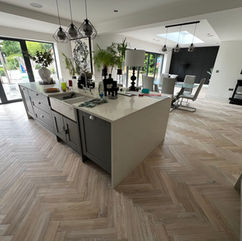 modern white herringbone flooring fitted in Warrington property