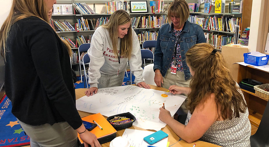 Teachers in Library_1_edited.jpg