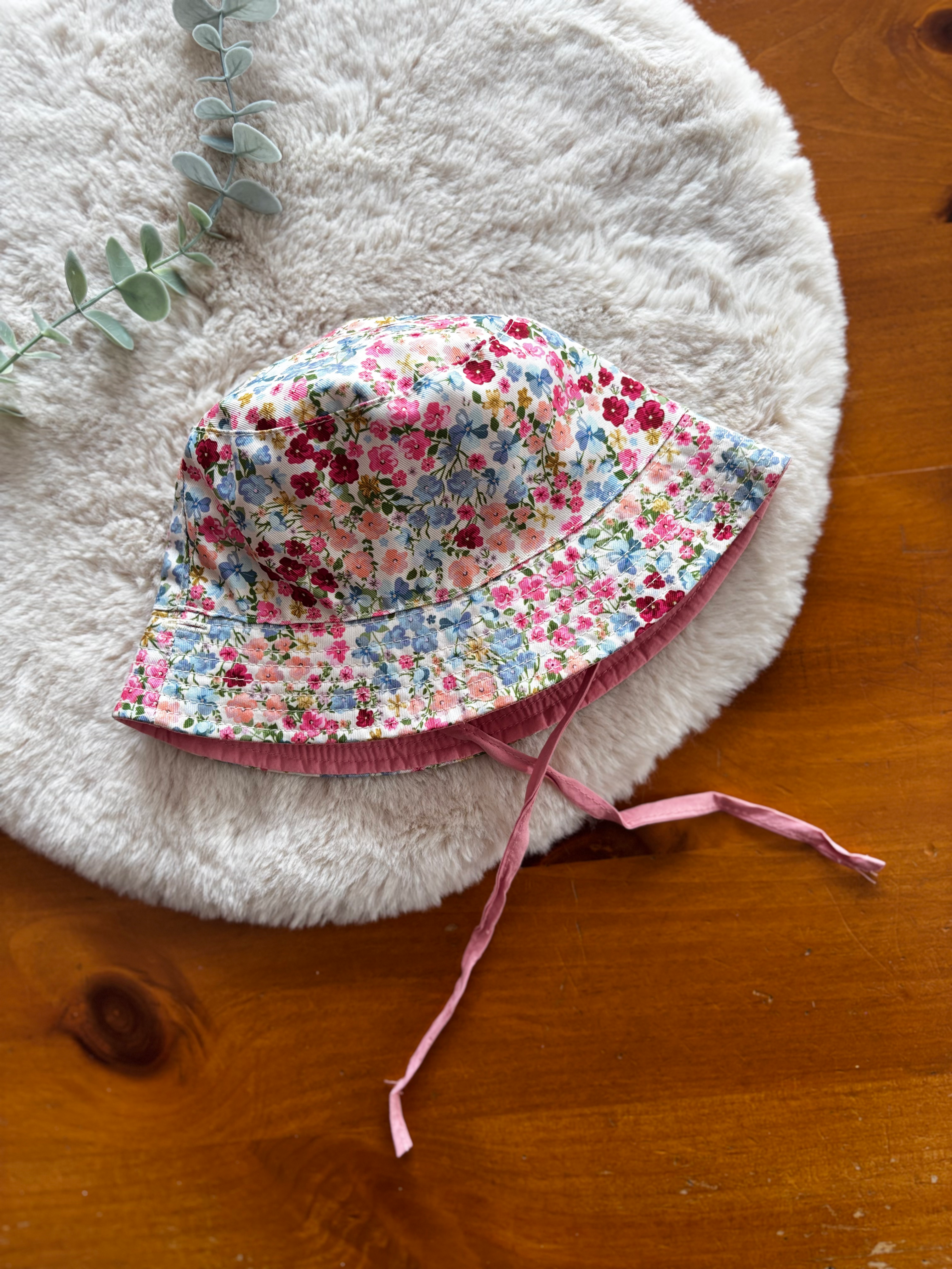 Chapeau réversible Tag 12-24 mois (environ)