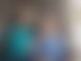 An elderly man and a woman share a warm, emotional moment in a cozy indoor setting. The woman is gently resting her hand on his shoulder, and they are both smiling, with the man appearing deeply moved. The image has a logo for "P&H Health Services" in the top-right corner, featuring a heart-shaped design in blue and gold colors.